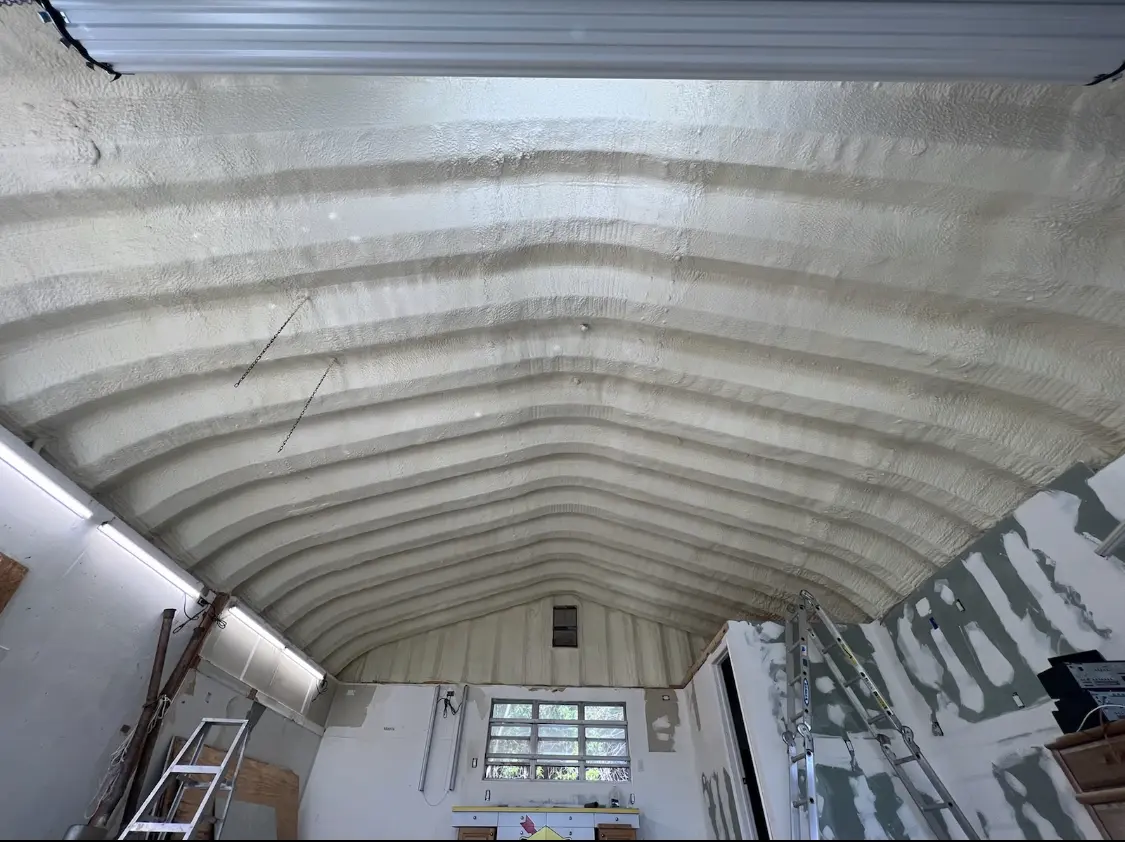 Spray polyurethane foam applied to the underside of a metal roof deck in South St. Paul